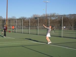 Me playing the NEXT DAY, after getting GLUTENED!  Look at that form-we won our doubles match too!!!